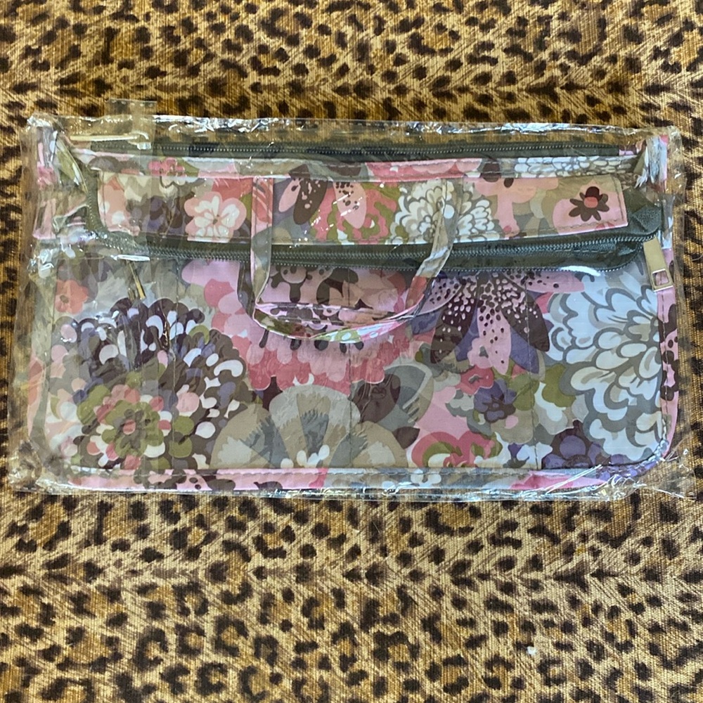 COPY - Cool multi compartment organizer bag! Pretty colors and patterns . Great…